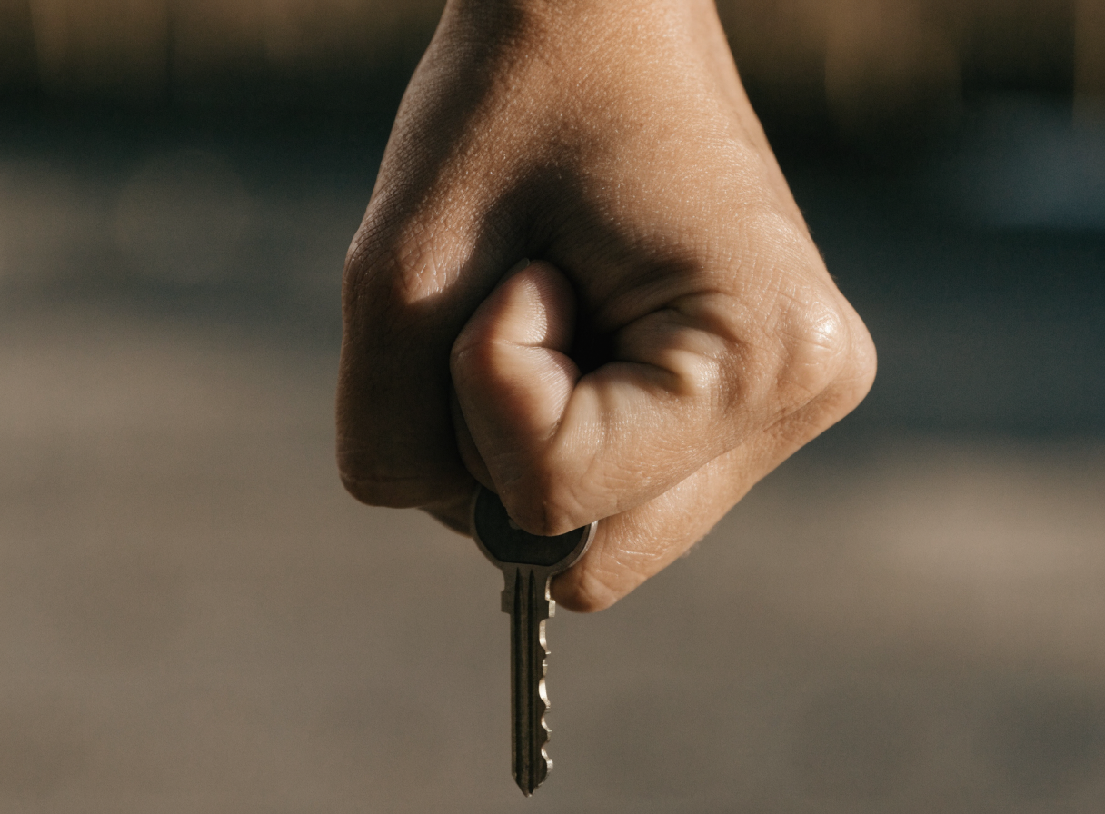 A key on a table in low light